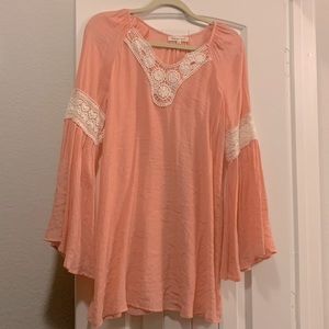 Boutique bought light orange shirt